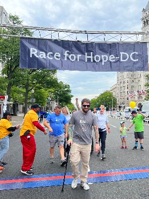 Joe Murray crosses the finish line during our first year participating in the Race for Hope